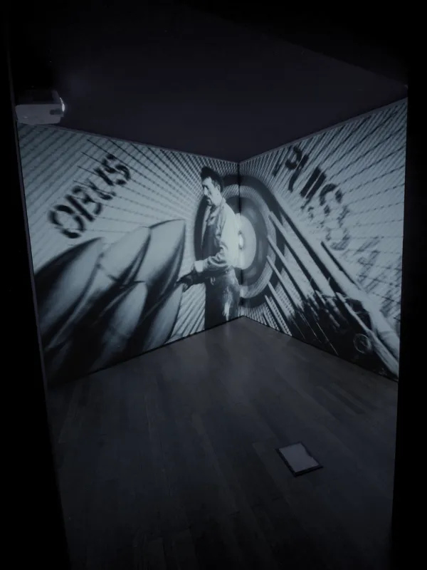 Immersive film projected onto a corner of a wall.